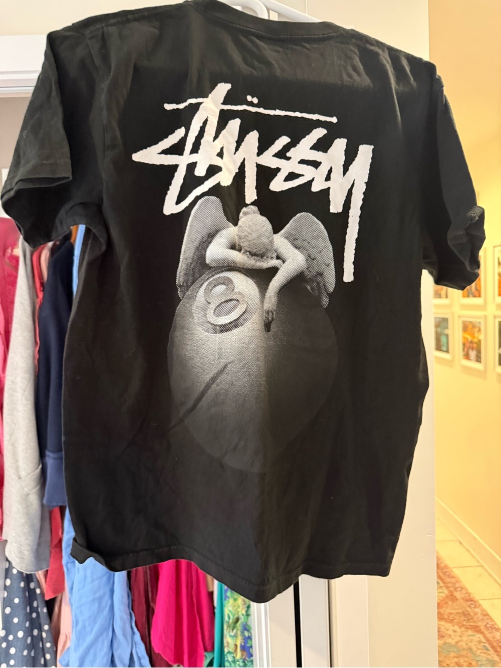 Stussy Black Tee with White Logo and Gray 8-Ball Angel Graphic